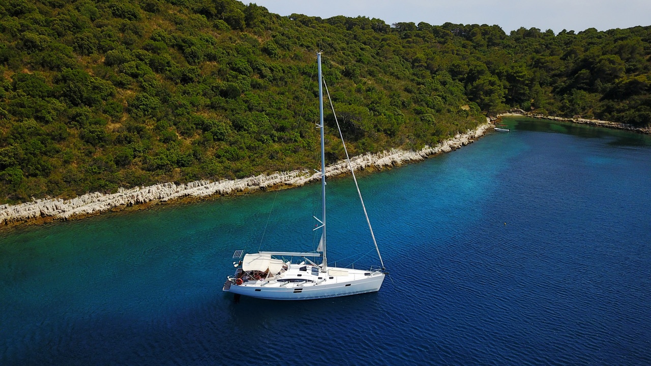 A SECLUDED BAY WITH ELAN IMPRESSION 494 WILD WIND - SAILING IN CROATIA