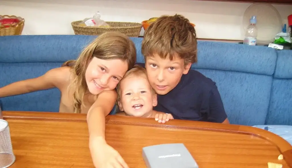 Happy kids inside a boat