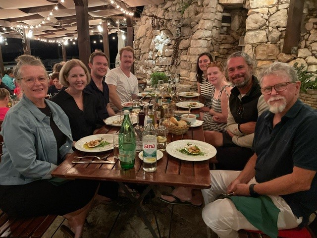 Guests with skipper eating in Konoba in Croatia 